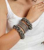 Stacked bracelet set with ghungroo bangle and aakshi bracelet