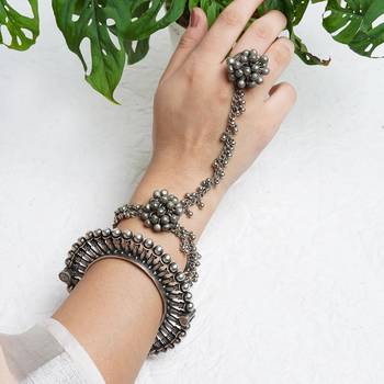 Elegant silver oxidised stacked bracelet set with bangle, haathphool, and lock clasp 1