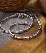 Delicate silver-plated oxidised anklets with chain and ghungroo accents