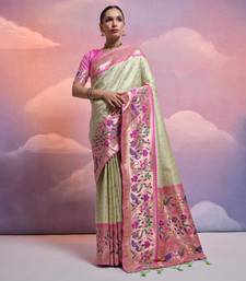 Pista Green Soft Banarasi Saree With Kanjivaram Weaving Texture And Contrast Weaving Border With Blouse