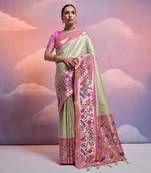 Pista Green Soft Banarasi Saree With Kanjivaram Weaving Texture And Contrast Weaving Border With Blouse