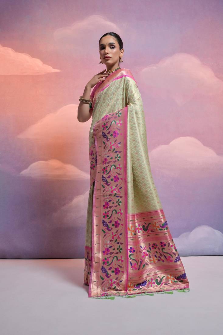 Pista Green Soft Banarasi Saree With Kanjivaram Weaving Texture And Contrast Weaving Border With Blouse