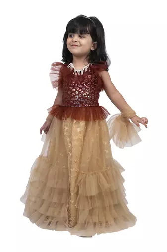 Twisha halter frilled top with  layered ghaghra-maroon and beige