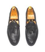 Woven leather tassel slipons