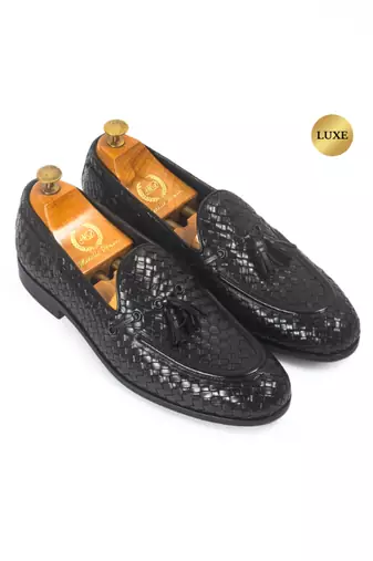 Woven leather tassel slipons