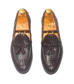 Woven leather tassel slipons