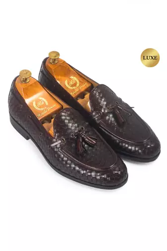 Woven leather tassel slipons