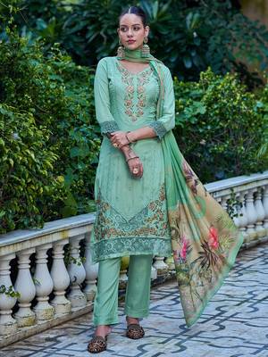 green muslin embroidered dress material 1