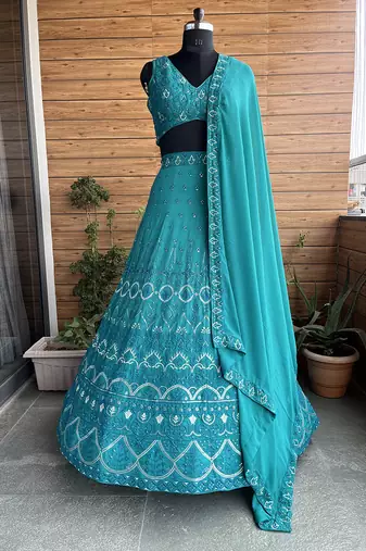  Teal Embroidered Faux Georgette Lehenga Choli
