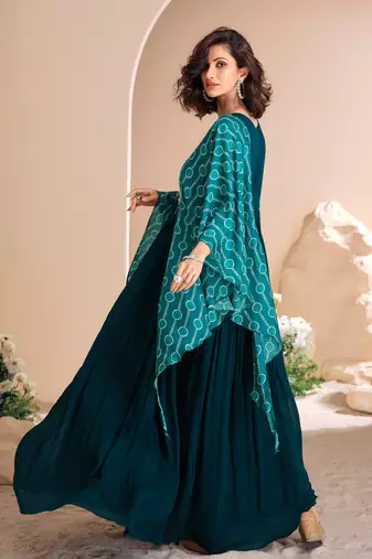 Teal blue embroidered chiffon free size stitched gown.(size Free size full stitched Up To 42")