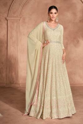 beige embroidered georgette  free size stitched gawn.(size Free size full stitched Up To 42") 1