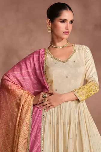 cream embroidered jacquard free size stitched gawn.(size Free size full stitched Up To 42")