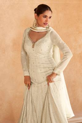 white embroidered georgette  free size stitched gown.(size up to 42") 2