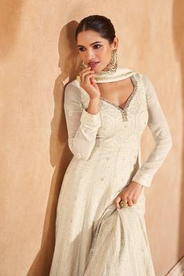 white embroidered georgette  free size stitched gown.(size up to 42") 3