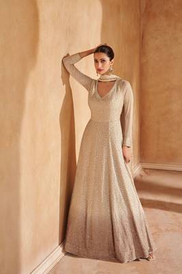 fawn embroidered georgette  free size stitched gown.(size up to 42") 1