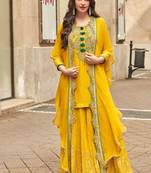 mustard embroidered silk  free size stitched sharara straight.(size up to 42")