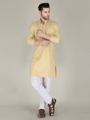 Men gold solid cotton blend kurtas 1