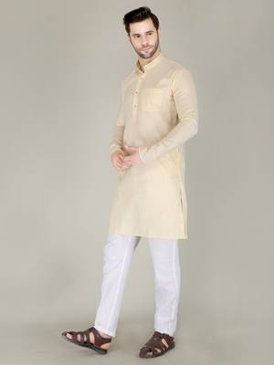 Men beige solid cotton blend kurtas 1
