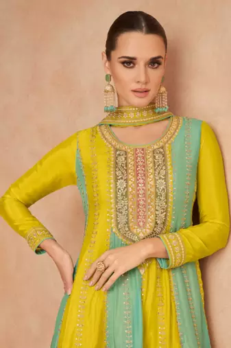 Yellow embroidered chinnon free size stitched palazzo anarkali.(size up to 42")