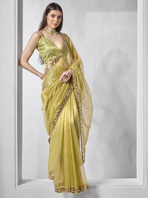 Green gold tissue net solid texture saree with graceful gold cotted 1