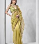 Green gold tissue net solid texture saree with graceful gold cotted