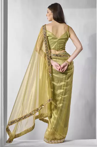 Green gold tissue net solid texture saree with graceful gold cotted