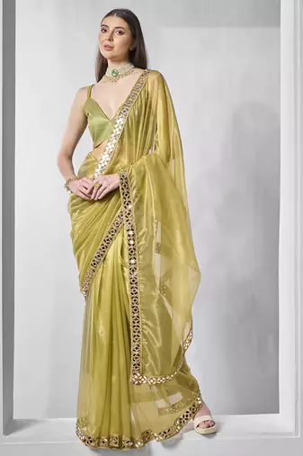 Green gold tissue net solid texture saree with graceful gold cotted
