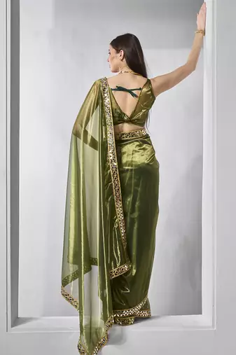 Green gold tissue net solid texture saree with graceful gold cotted
