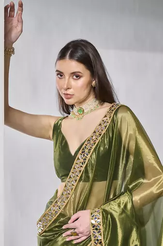 Green gold tissue net solid texture saree with graceful gold cotted