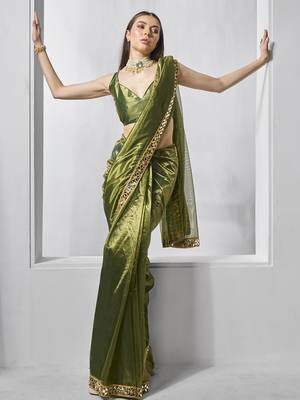 Green gold tissue net solid texture saree with graceful gold cotted 5