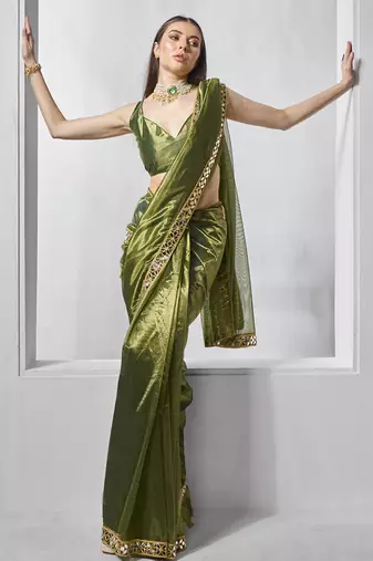 Green gold tissue net solid texture saree with graceful gold cotted