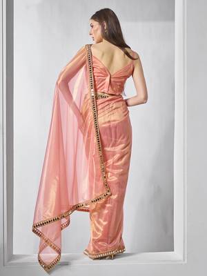 Orange gold tissue net solid texture saree with graceful gold cotted 2