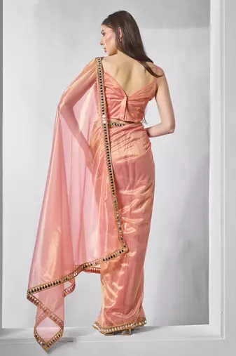 Orange gold tissue net solid texture saree with graceful gold cotted