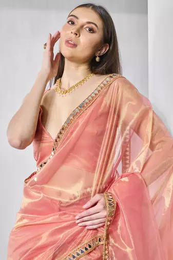 Orange gold tissue net solid texture saree with graceful gold cotted