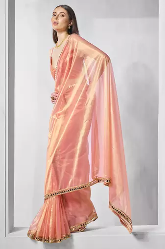 Orange gold tissue net solid texture saree with graceful gold cotted