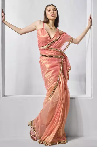 Orange gold tissue net solid texture saree with graceful gold cotted