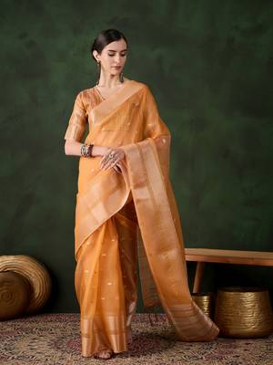Orange khadi organza ethnic woven saree festive looks 1