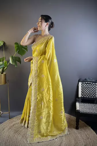 Yellow gold crunchy saree with sequins embroidery and cut work
