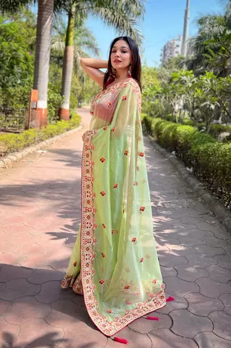 Green silver tissue silk blend heavy embroidery saree ceremonial saree