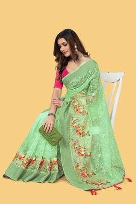 Green woven patta organza silk blend saree with embroidery and stone work 4