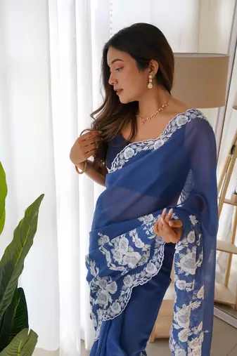 Blue thai organza silk blend fancy thread embroidery with cut dana work saree