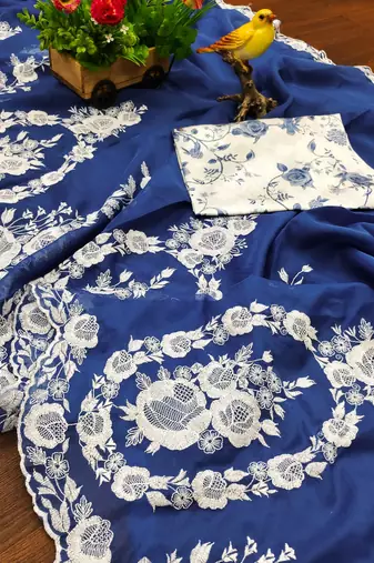 Blue thai organza silk blend fancy thread embroidery with cut dana work saree