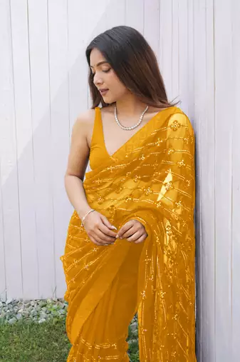 Yellow graceful butterfly net sequins embroidery saree with diamond work