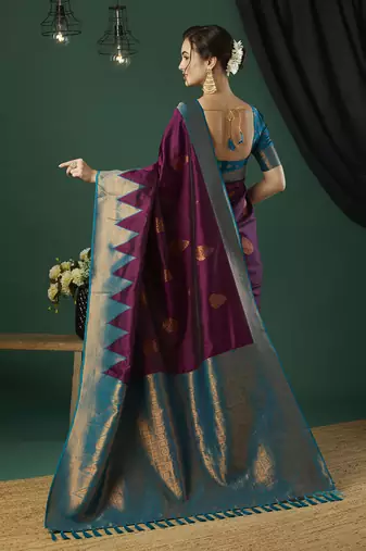 Wine faux banarasi silk blend wevon zari heavy and ethnic partywear saree