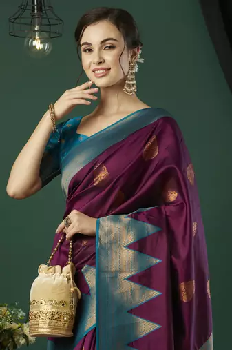 Wine faux banarasi silk blend wevon zari heavy and ethnic partywear saree