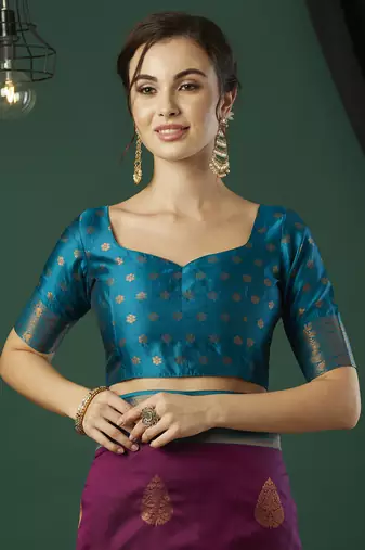 Wine faux banarasi silk blend wevon zari heavy and ethnic partywear saree