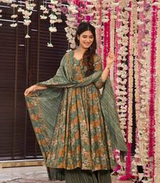 Green beautiful print designer readymade partywear muslin suit