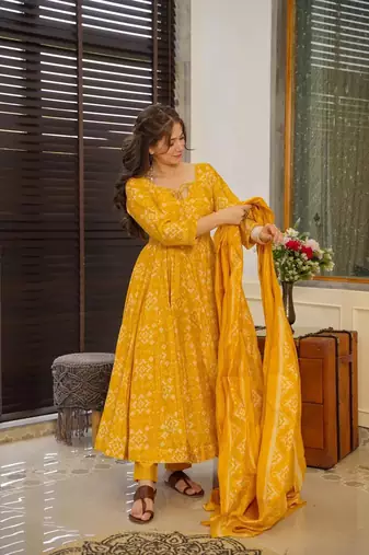 Yellow beautiful print readymade partywear muslin suit