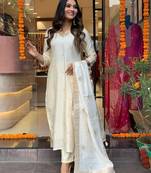 Off white colour viscosee chanderi fabric partywear ready suit with embroidery work