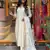 Off white colour viscosee chanderi fabric partywear ready suit with embroidery work